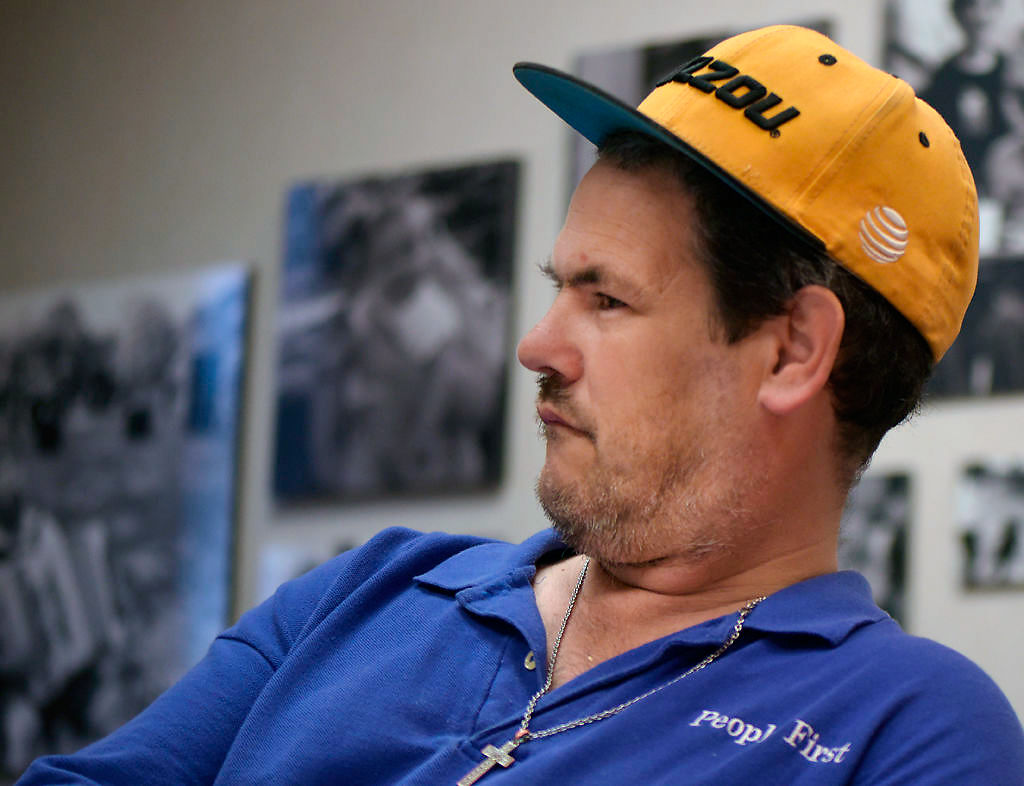 Arnold Larson listens to a group discussion